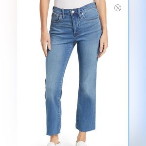 Madewell Cali demi bootcut raw hem cropped jeans.